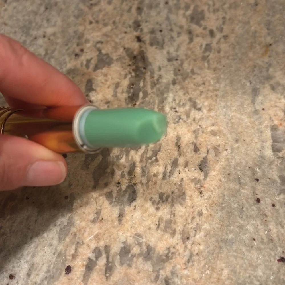 NWOT Color change lipstick. Never been used but has a dent on the tip